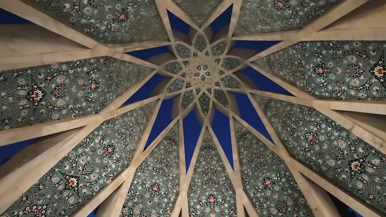 Intricate Geometric Ceiling Pattern of a Traditional Persian Monument