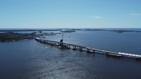 aerial dolly past new construction: kruunuvuori bridge in helsinki fin