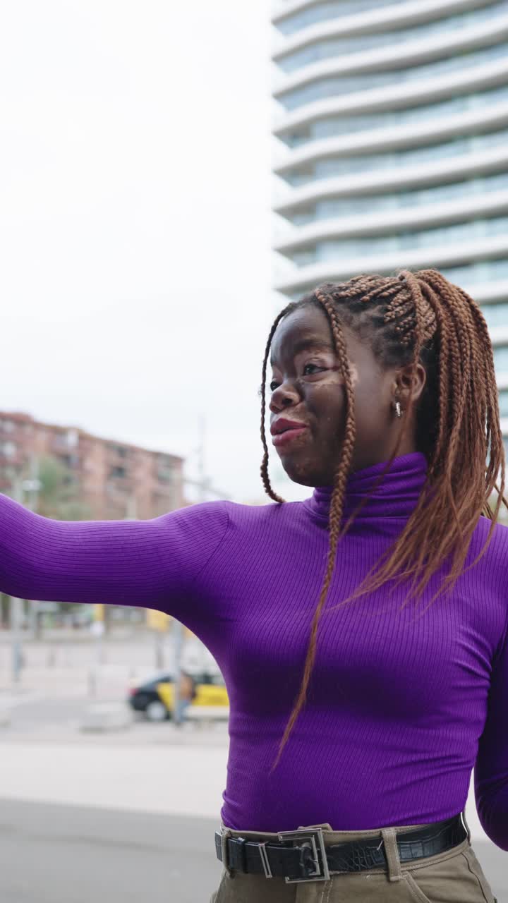 Woman Vlogging in Urban Setting