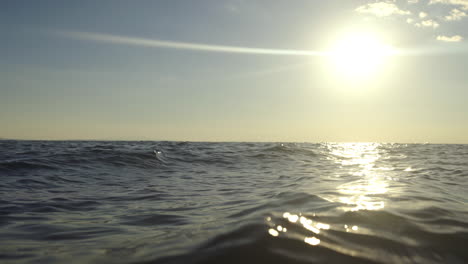 ocean waves with sunlight