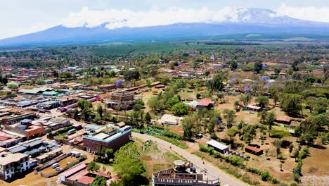 rural village town of kenya with kilimanjaro in the background