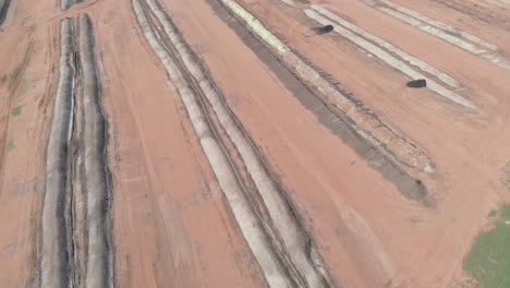 aerial view of sugar cane bagasse deposit, used to fertilize the field and plantation