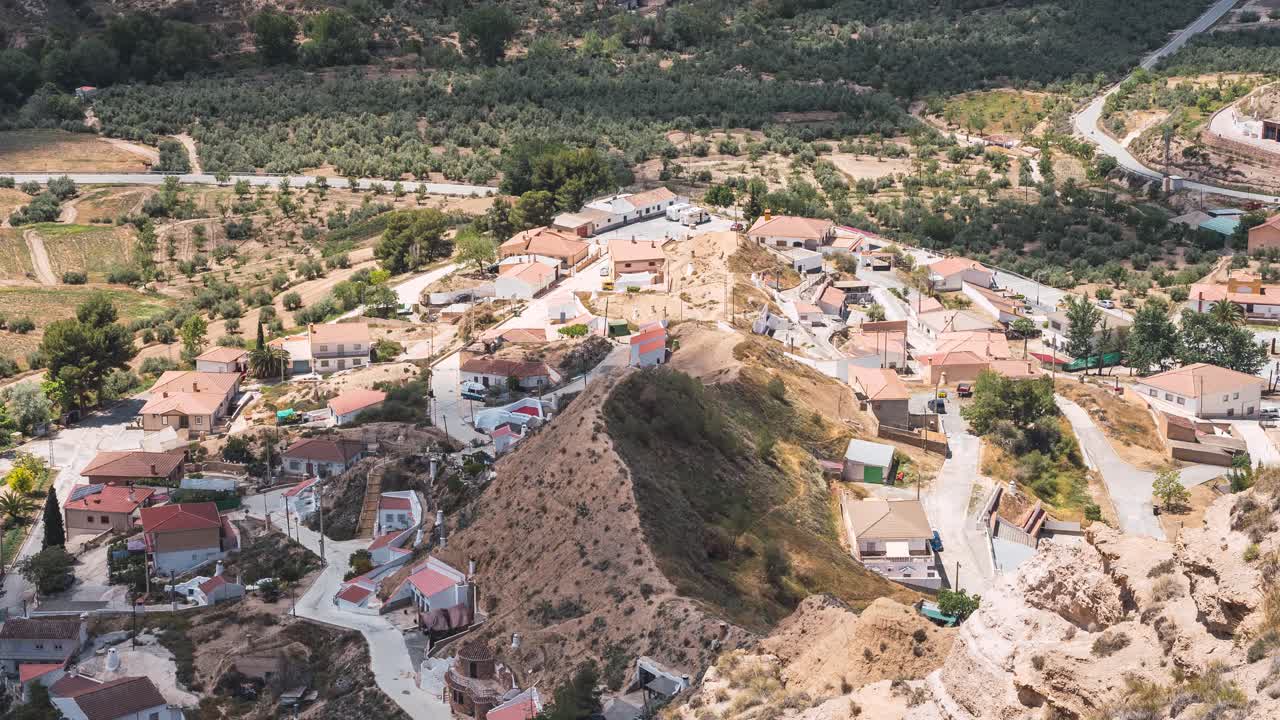 Town with moving cloud shadows in Gorafe desert