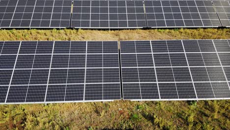 Solar-Power-Station-In-The-Field---aerial-sideways