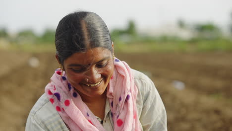 indian woman farmer in field