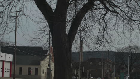 Rusty-water-tower-in-distance-in-Wilkes-Barre,-Pennsylvania,-Slow-Motion