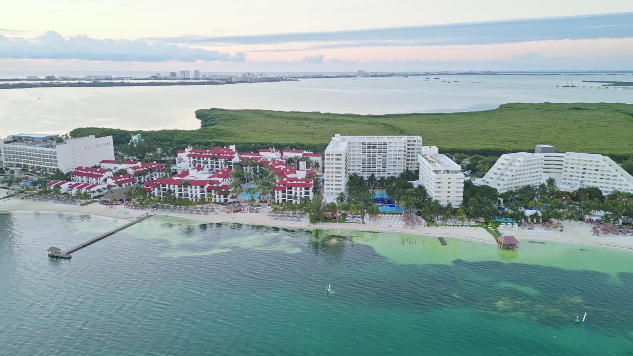 Cancun’s playa langosta with beachfront hotels and nichupte lagoon , aerial view