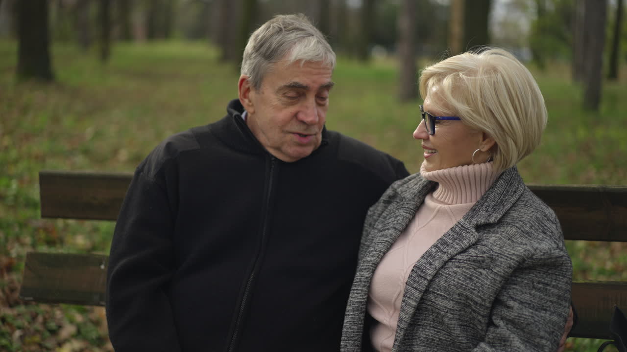 Elderly couple enjoying a moment in the park