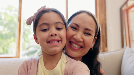 Selfie,-mother-and-daughter-on-sofa