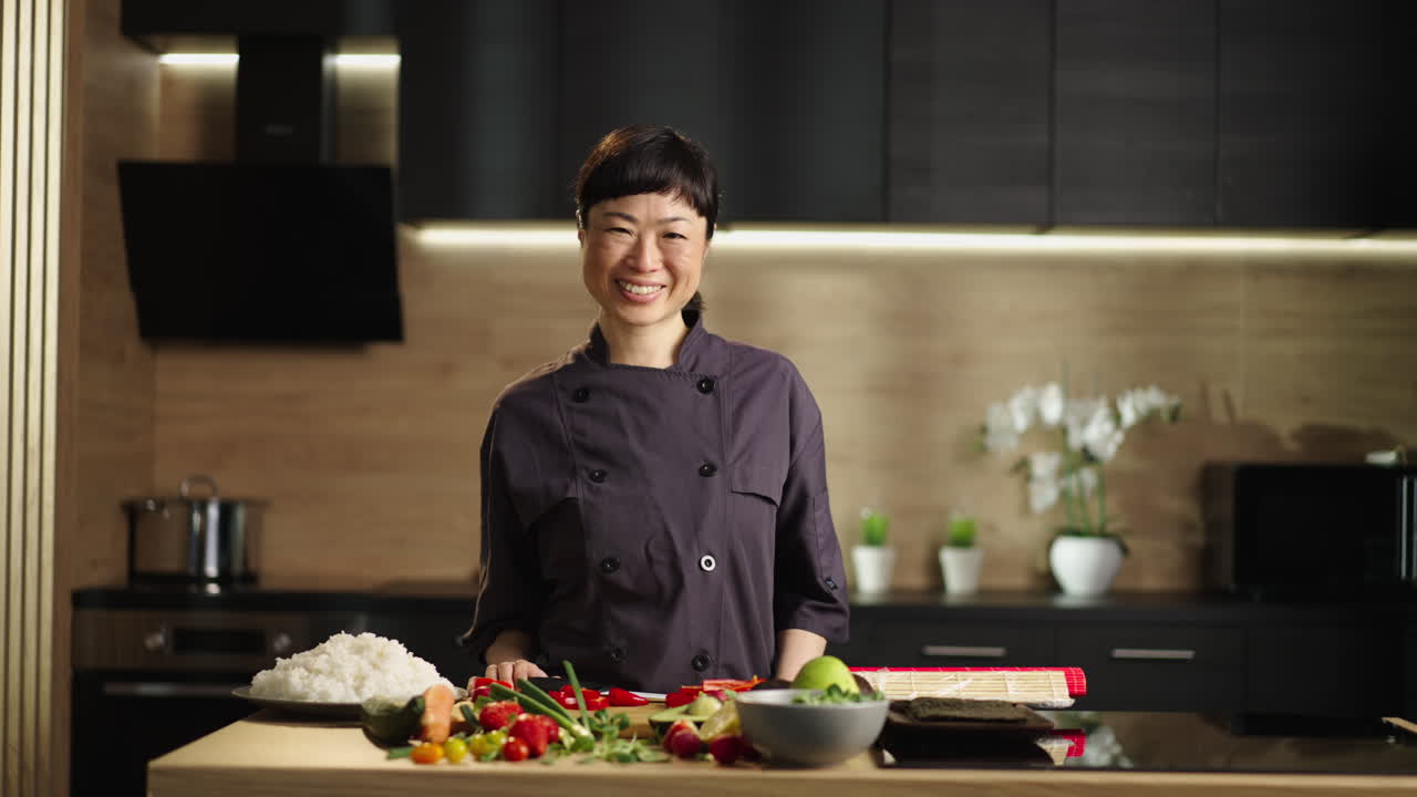 Asian Chef Preparing Sushi in Modern Kitchen