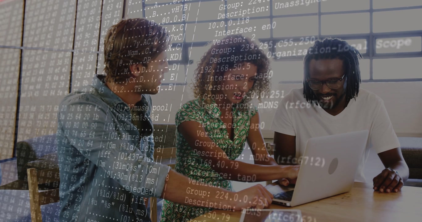 Vertical video: Team reviewing software on laptop, woman typing causing terminal overlay over scene