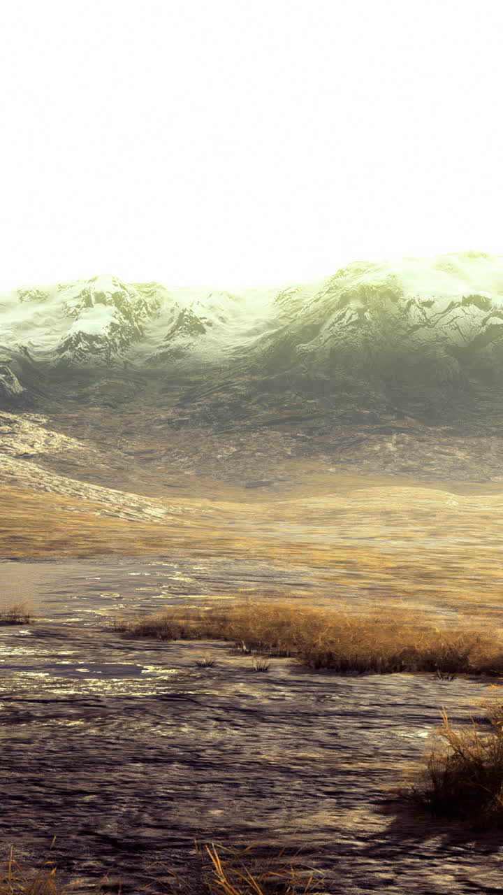 Majestic mountain landscape with soft glow illuminating the horizon