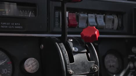 throttle and fuel mixture lever is small airplane cockpit close up