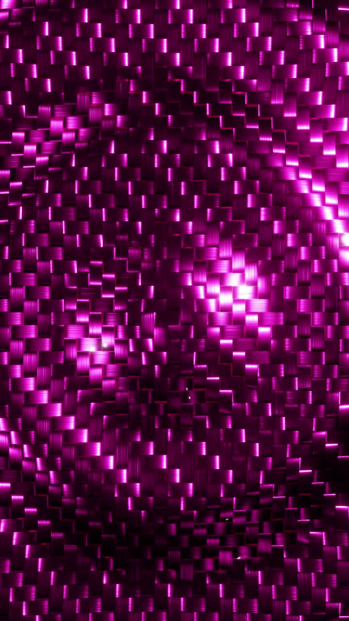 Shiny purple weave carbon fiber. Vertical looped video