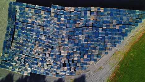 erial view of symmetrically stacked pallets in rural georgia