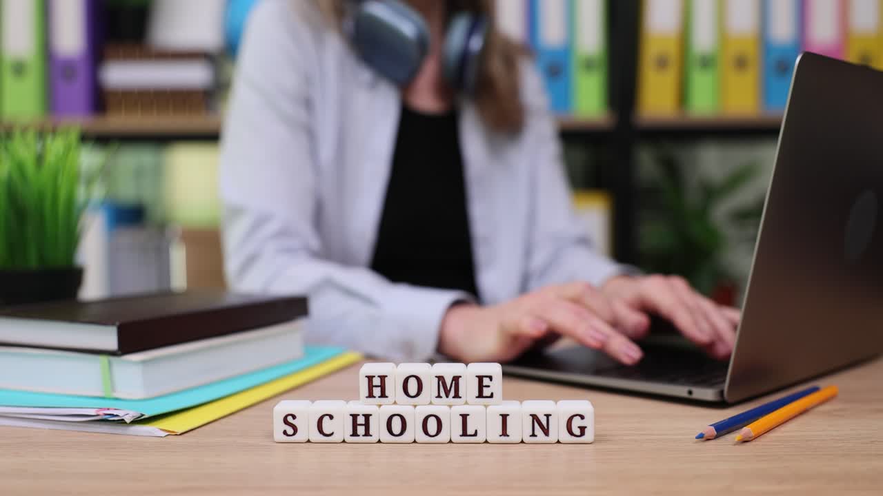 Homeschooling Setup with Laptop and Books