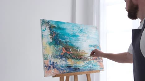 super slow motion 240 fps creative artist paints an abstract picture with colorful paints - super slow motion 240 fps, creative artist paints an abstract picture with colorful paints. contemporary works of art on canvas