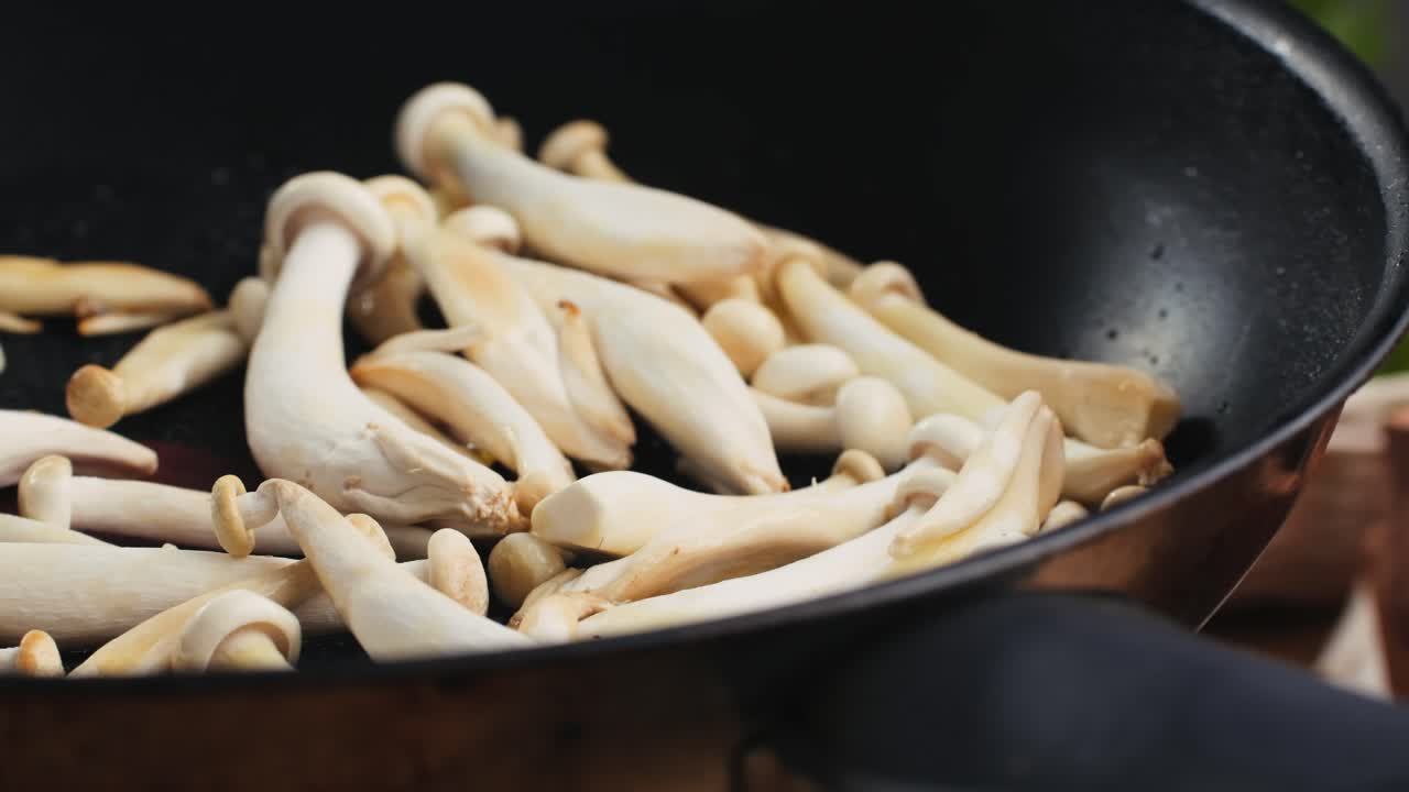 Cooking White Mushrooms in a Pan
