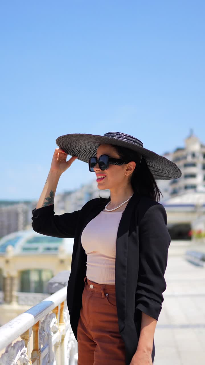 Stylish Woman in Hat and Sunglasses