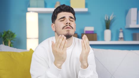 Young-man-praying-for-the-recovery-of-negativity.