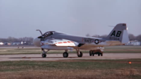 fighter bomber of the cold war parked ready to take of fin an original archival video