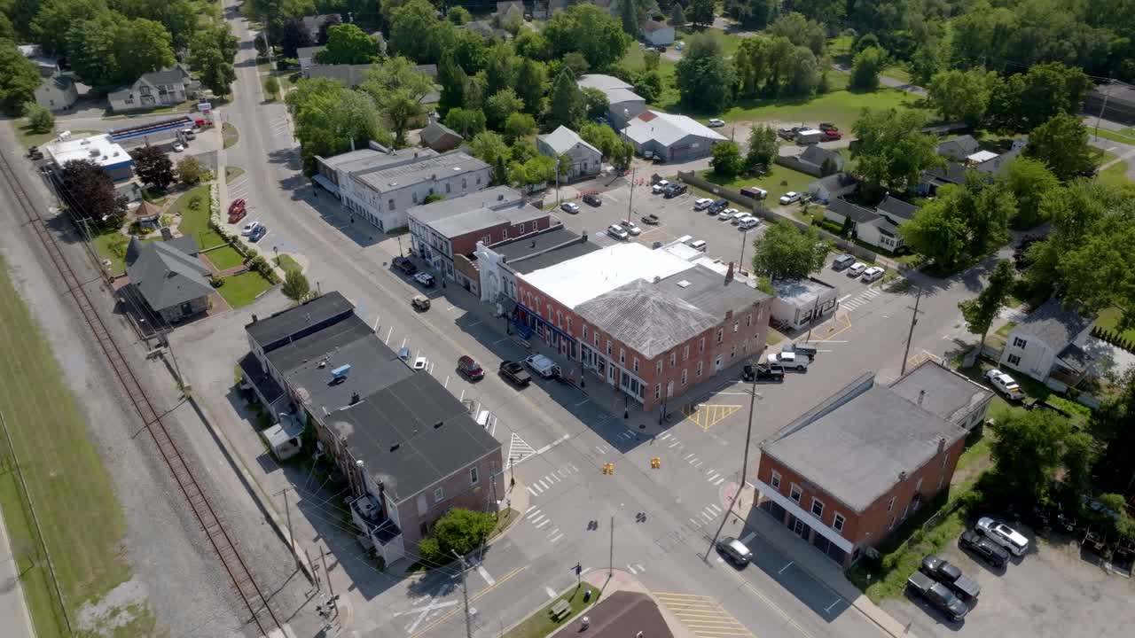 Downtown Grass Lake, Michigan with drone video moving in a circle