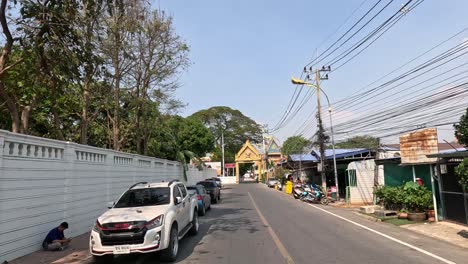 a vehicle's progression through a thai street
