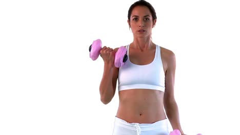 Pretty-woman-exercising-with-dumbells-