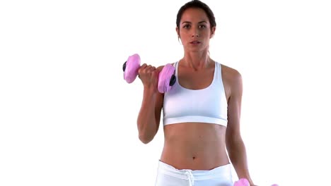 mujer bonita haciendo ejercicio con pesas