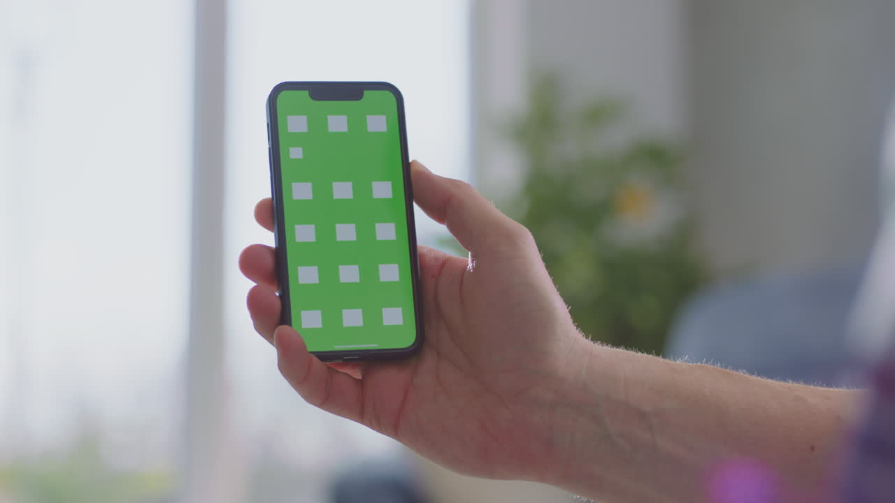 Human hands holding smartphone