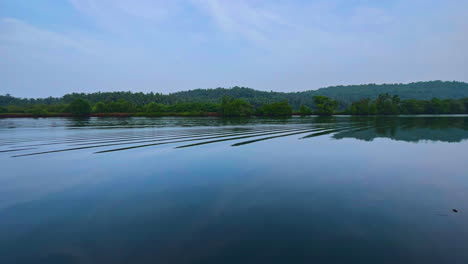 Sea-waves-during-calm-evening-and-mountain-in-the-horizon-Goa-India-4K