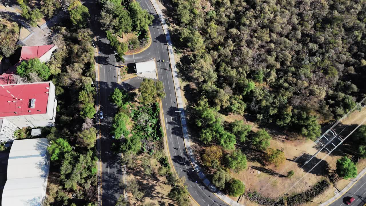 Cyclists on empty roads captured by a drone