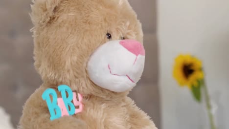 close up of a teddy bear on bed