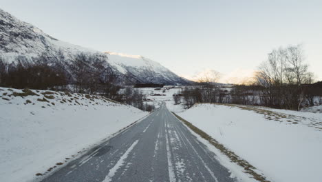 white snowy landscape in eresfjord norway in winter - wide shot