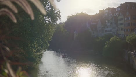 Walking-Towards-Bridge-Side-In-Tubingen,-Germany-in-4K-Downtown-Home-of-Europes-Oldest-University-At-Sunset