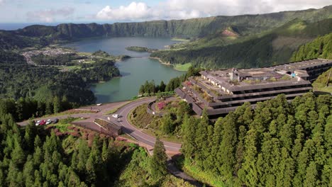 ruins of abandoned monte palace hotel overlooking sete cidades caldera