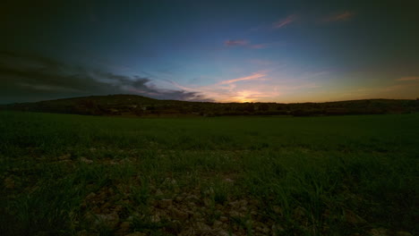 Stunning-timelapse-Boomerang-video-of-a-green-meadow,-gentle-hill,-and-floating-clouds-in-a-blue-sky