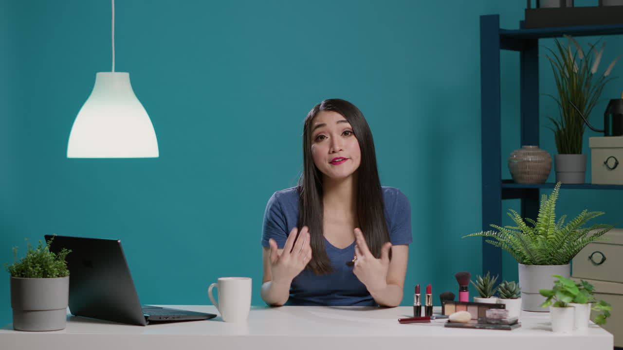 Content creator recording beauty vlog with cosmetics