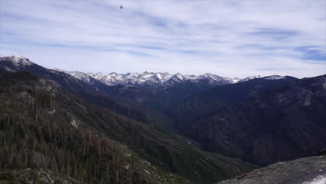 overlook with snow capped mountains in the distance