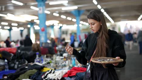 woman browsing a flea market