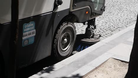 street sweeper cleaning the street