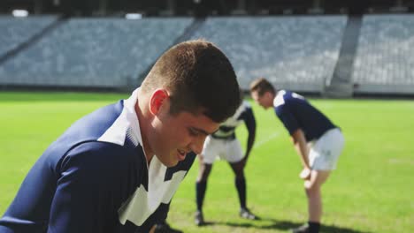 male rugby player disappointed after losing match in stadium 4k