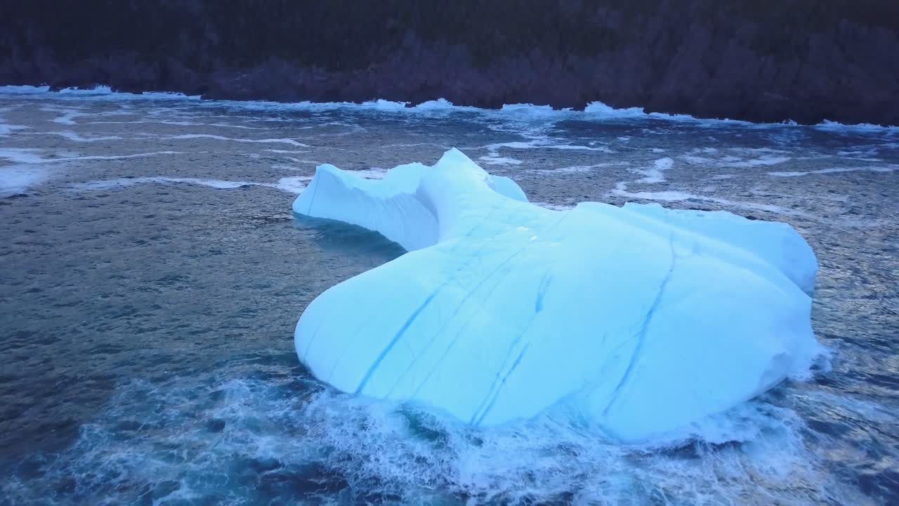 Iceberg floating near the coast