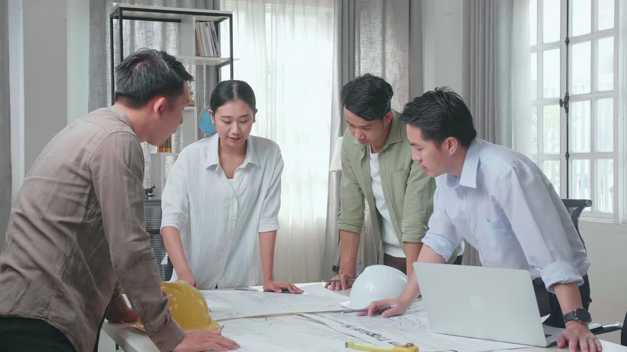 Team of Architects in Meeting