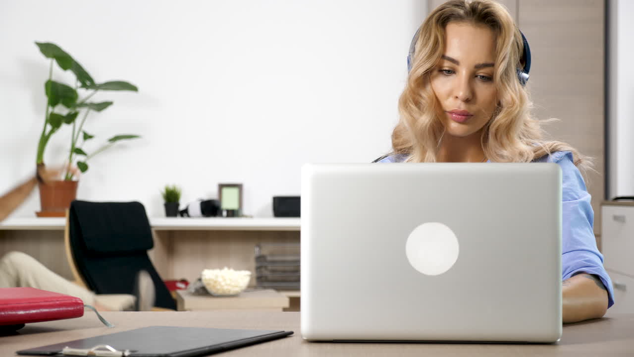 Office scene with people, technology, and snacks
