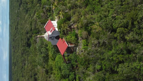 Aerial-parallax-around-Chapelle-Notre-Dame-de-Lourdes-on-Lifou