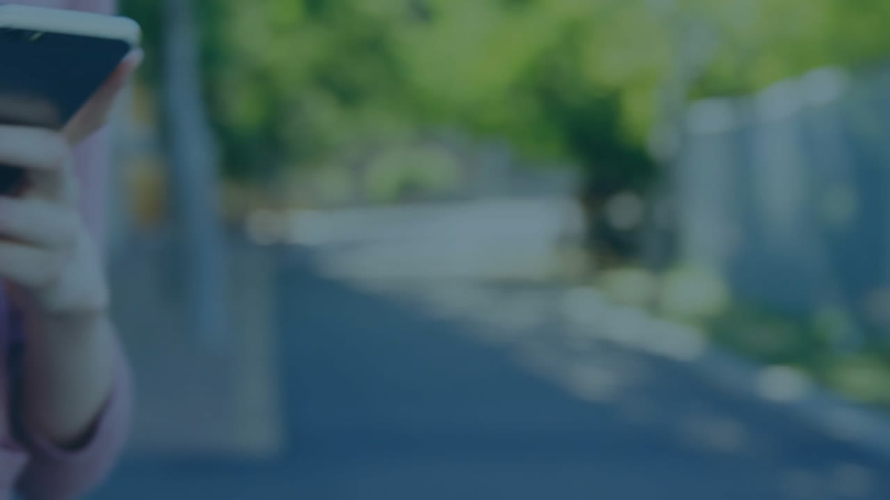 Woman tapping smartphone in park, activating animated stock chart overlay showing portfolio growth