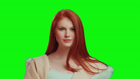 beautiful red-haired girl on a green background, easy to cut