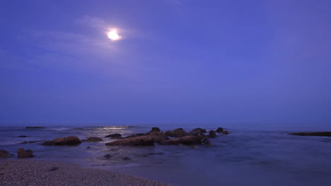 time lapse of beach at night on the mediterranean sea