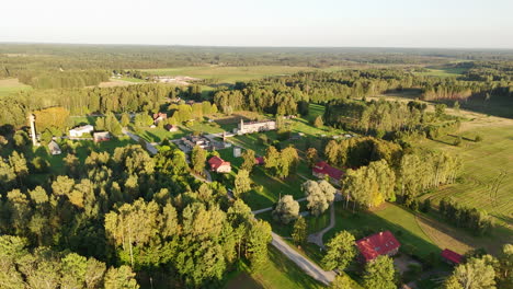 aerial view of the more parish (administrative center) in the rural countryside of sigulda, latvia.